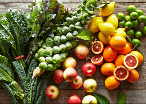 a group of fruits and vegetables on a wood surface Healthy Weight Loss Diets Dudley